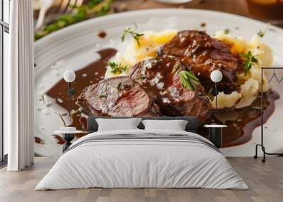 BBQ sauce on beef tenderloin served with mashed potatoes on a white plate Wall mural