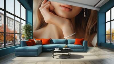 Diamond jewelry bracelet worn by young woman Wall mural