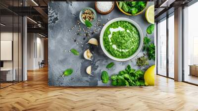 Fresh green chutney with mint yogurt spices Served with rice lemon garlic and parsley Grey background copy space Wall mural