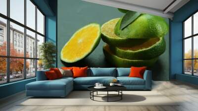 Green sweet tangerines growing with background Wall mural