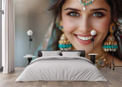 Indian beauty with a blue jewelry set donning a traditional saree Wall mural