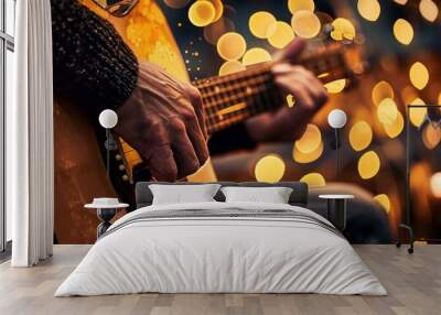 Person playing guitar with fingers on bar in dimly lit night scene Wall mural