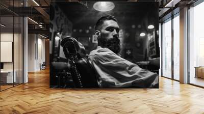 Skilled stylist in modern barber shop vintage chair black and white décor bearded client Wall mural