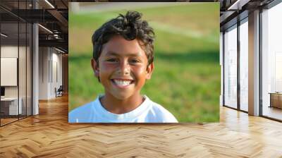 Smiling young Hispanic soccer athlete Wall mural