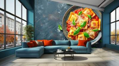 Top down image of ravioli with tomato sauce Parmesan and basil on rustic backdrop space for text Wall mural