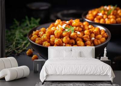 Trendy vegan snack Spicy chickpeas roasted and shown on dark background Wall mural