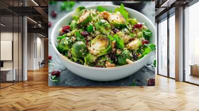 vegan quinoa salad with fried brussels sprouts cranberries and nuts in a white bowl Wall mural