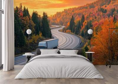 White truck driving on forested highway at autumn sunset Wall mural