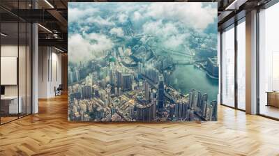 Bird's eye or aerial view through the clouds to large metropolis city of Hong Kong. Wall mural