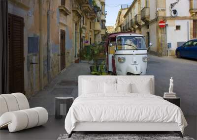 Ape Tuk Tuk in downtown of Syracuse, Sicily, Italy Wall mural