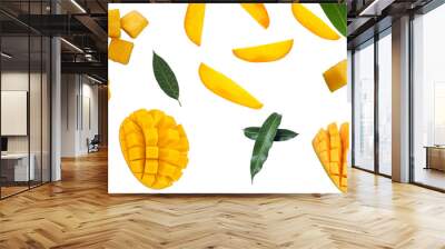 Mango slices and leaves falling isolated on a white background. Wall mural