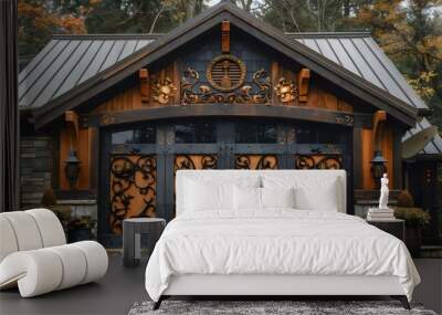 A large black and brown house with a fancy wrought iron gate Wall mural