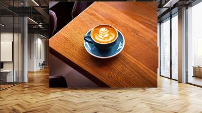 Coffee cup with drawing on cafe table Wall mural