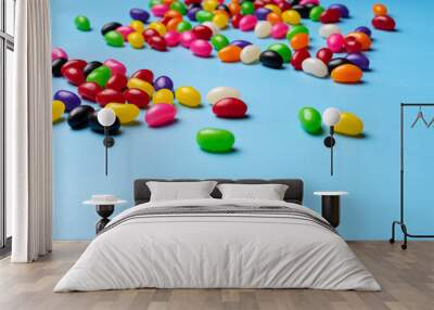 colourful jelly beans candies blue background Top view Wall mural