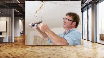 electrician straightents wire Wall mural