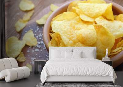 Potato chips in bowl. Fast food. Wall mural