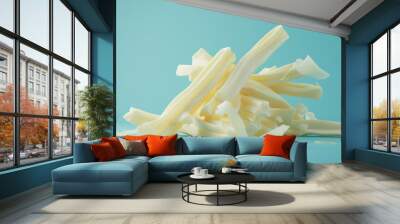 String Cheese Pile on Blue Background Wall mural