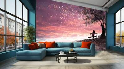 Fantasy illustration with beautiful sky, stars.  girl is sitting on a bench under an tree and looking at the sunset, cute  landscape. Painting. floral meadow and stairs Wall mural