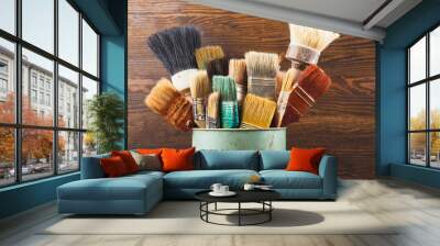 Different brushes in the bucket Wall mural