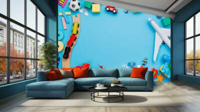 Frame of kids toys on blue background Wall mural