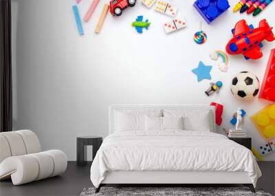 Frame of kids toys on white background with copyspace Wall mural