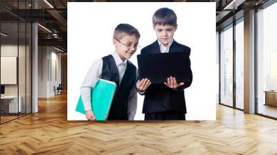 Two boys looking at laptop Wall mural