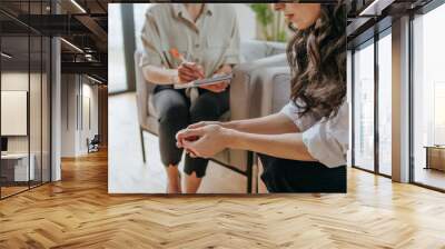 Young woman talking about her mental health problems Wall mural