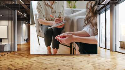 Young woman talking about her mental health problems Wall mural