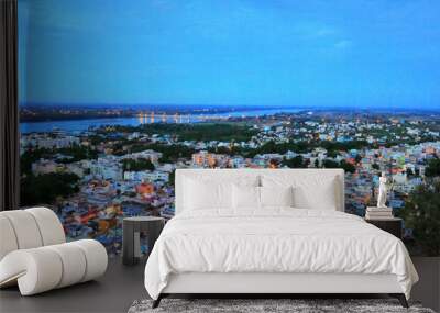 Beautiful evening scene of Trichy (Tiruchirapalli) city and Kaveri river with a bridge - view from ancient Rock Fort (Rockfort) and Hindu temple, Tamil Nadu state, India, South Asia Wall mural