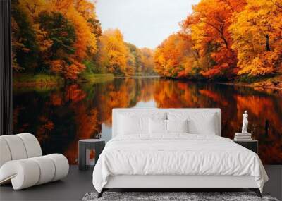 Tranquil autumn scene with vibrant fall foliage reflected in a still lake. Wall mural