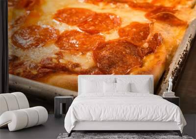 Delicious authentic New York style Sicilian pizza with pepperoni in pan  Wall mural