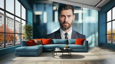 Portrait of a successful boss, photo of a close businessman, successful and pensive looking at the camera, a man with a beard in a modern office Wall mural