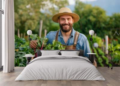 Portrait farmer holding wooden box full beets with bright red stems lush leaves middle farm field Wall mural