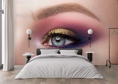 Close up of beautiful woman eye with multicolored smokey eyes makeup. Modern fashion make up. Studio shot Wall mural