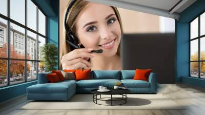 Portrait of beautiful call center operator at work Wall mural