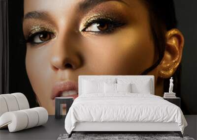 Woman with fashion golden makeup Wall mural