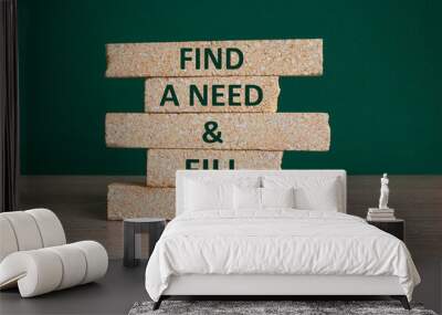 Find a need and fill it symbol. Concept words Find a need and fill it on brick blocks. Wooden table, beautiful green background. Business and find a need and fill it concept. Copy space. Wall mural