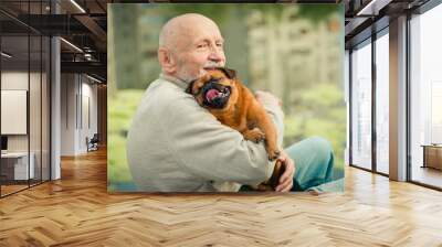 Grandfather with a dog of the Griffon breed Wall mural