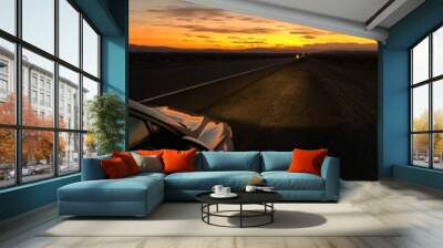 highway during sunset with car Wall mural