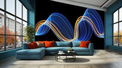 Long exposure, light painting photography.  Electric blue and vibrant metallic gold colour, waves and swirls, parallel lines pattern of movement, against a clean black background Wall mural