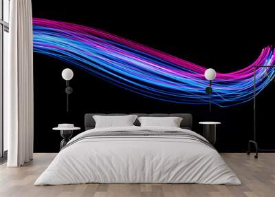 Long exposure, light painting photography.  Vibrant electric blue and neon pink streaks of colour against a black background Wall mural