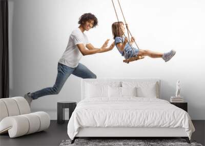 African american guy pushing a little girl on a swing Wall mural