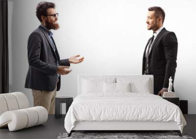 Bearded man talking to a man in a suit holding a briefcase Wall mural