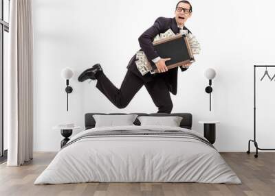 Businessman running with a bag full of money Wall mural