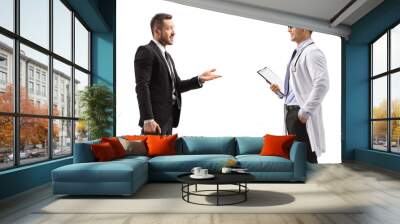 Businessman with a briefcase talking to a doctor Wall mural