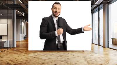 Cheerful man with a microphone gesturing with hand Wall mural