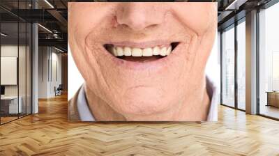 Close-up on cheerful senior man smiling Wall mural