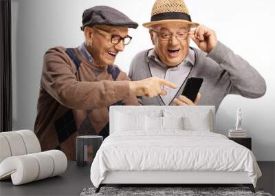 Elderly man showing a mobile phone to another man and smiling Wall mural