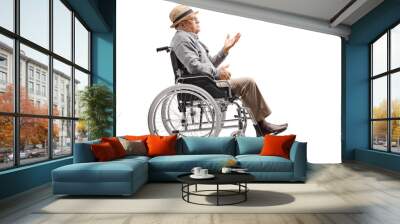 Elderly man sitting in a wheelchair and gesturing a conversation Wall mural