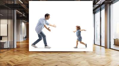 Father and little girl running towards each other to hug Wall mural